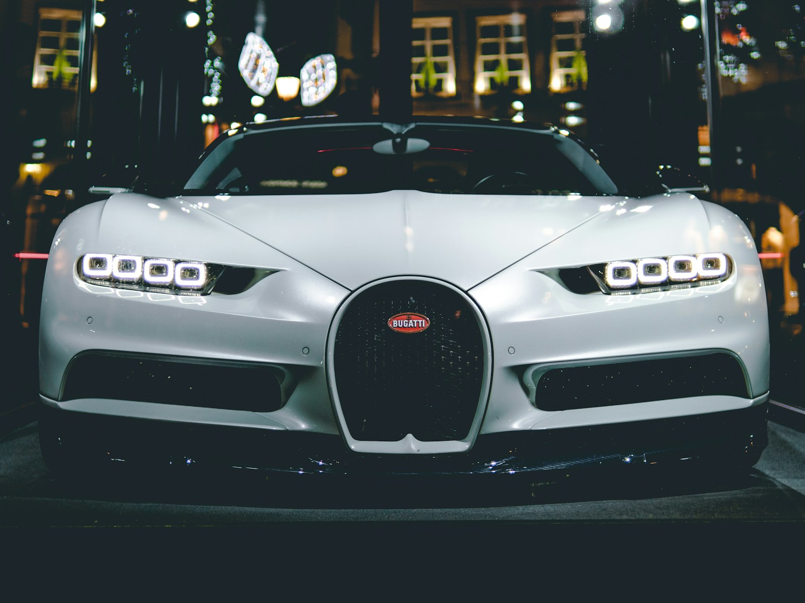 Luxury vehicle in premium dark studio environment